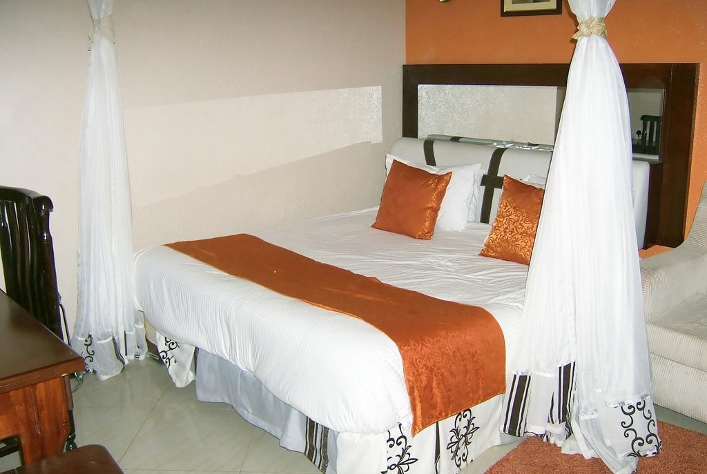 Milimani Holiday Resort Кисуму Номер фото